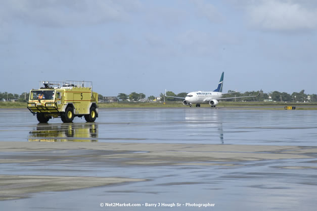 MBJ Airports Limited Welcomes WestJet Airlines - Inaugural Scheduled Service From Toronto Pearsons International Airport - Monday, December 10, 2007 - Sangster International Airport - MBJ Airports Limited, Montego Bay, Jamaica W.I. - Photographs by Net2Market.com - Barry J. Hough Sr, Photographer - Negril Travel Guide, Negril Jamaica WI - http://www.negriltravelguide.com - info@negriltravelguide.com...!