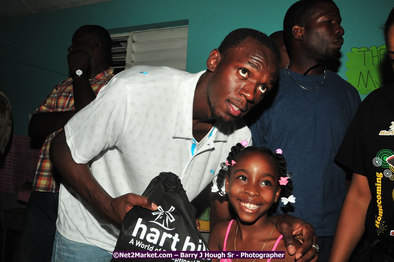 Usain Bolt of Jamaica - The Fastest Man In The World  - Usain Bolt Homecoming Celebrations - Press Conference at the Grand Bahia Principe &amp; Sherwood Content - Waldensia Primary School - Photographs by Net2Market.com - Barry J. Hough Sr. Photojournalist/Photograper - Photographs taken with a Nikon D300 - Negril Travel Guide, Negril Jamaica WI - http://www.negriltravelguide.com - info@negriltravelguide.com...!